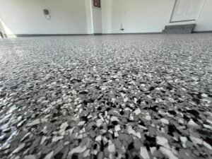 Epoxy garage floor coating Jacksonville FL installed by professional painters durable and easy to clean